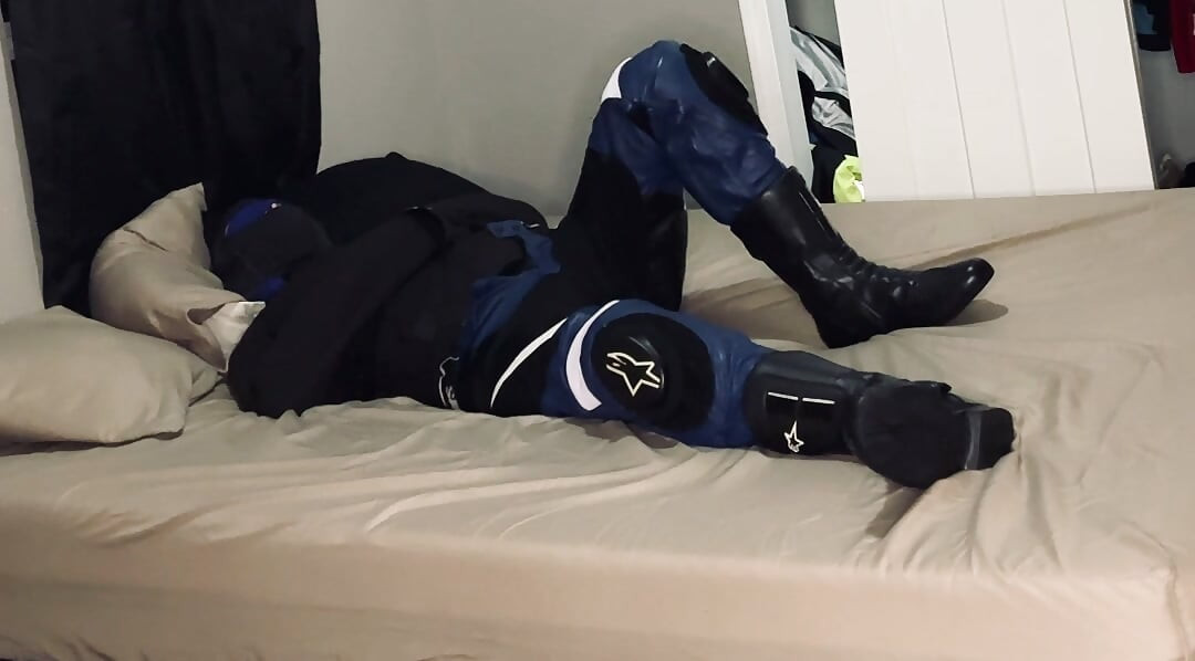 Biker in A Straitjacket and Tied