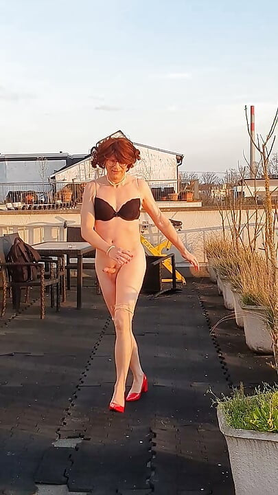 Naked on the roof terrace
