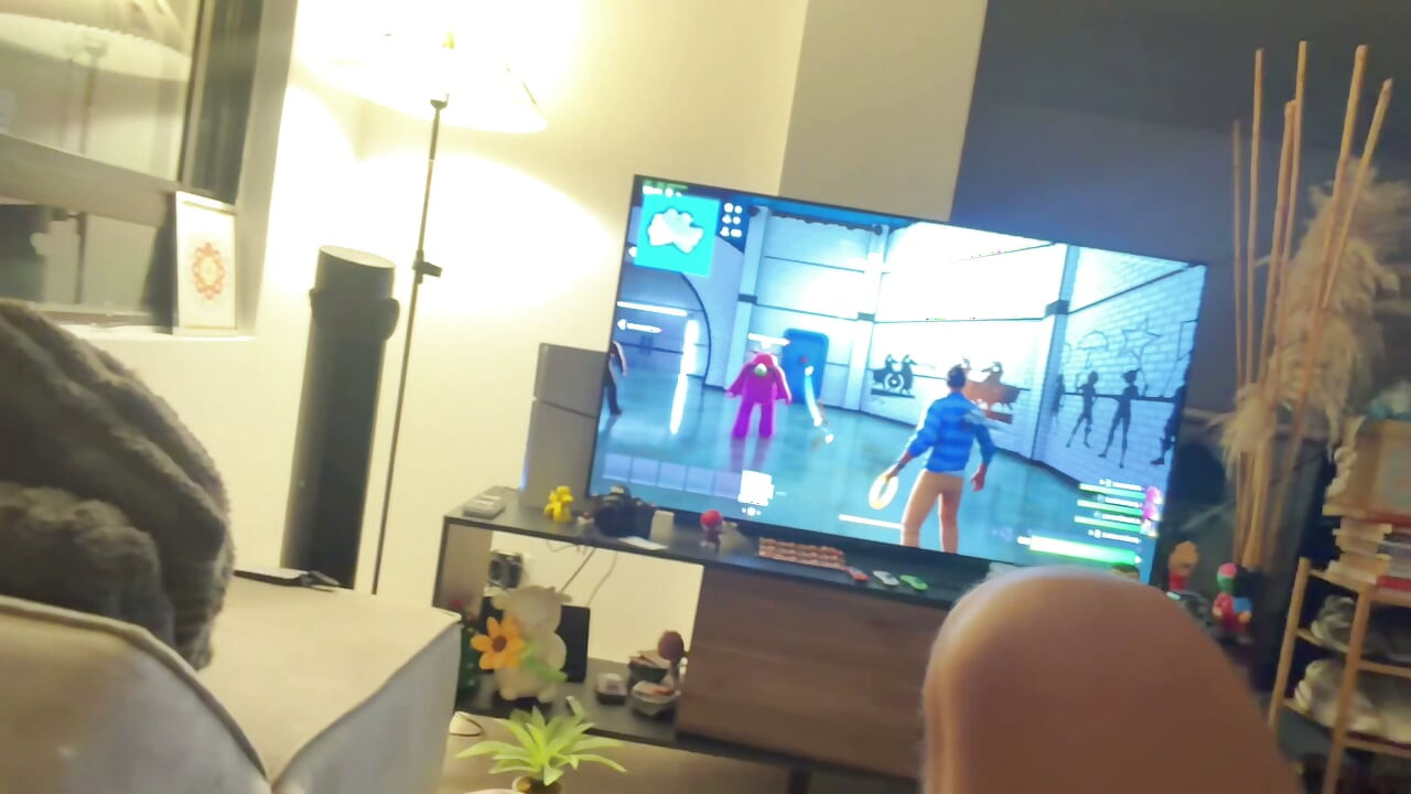Sucking balls while jerking off and playing video games