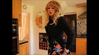 Sindy in black blouse with floral skirt