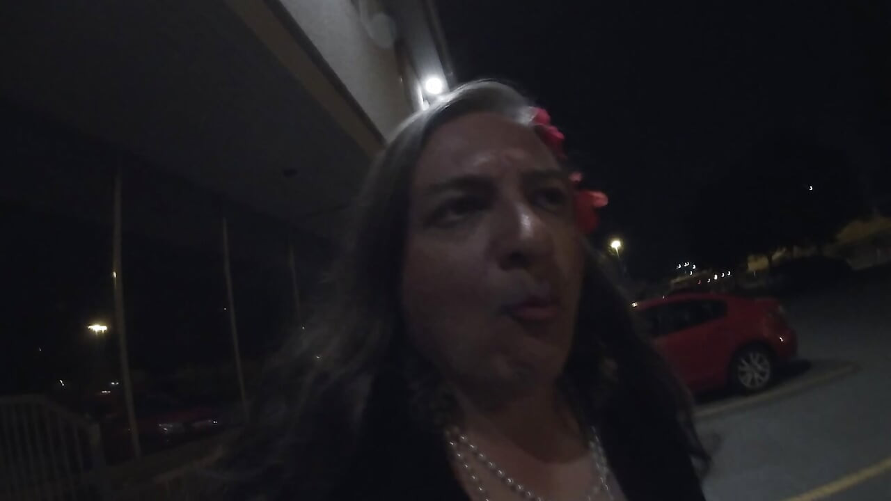 Midnight whore CD is walking around a car parking lot lookking to get lucky