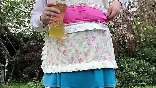 In gardener outfit to take a piss shower with bottles