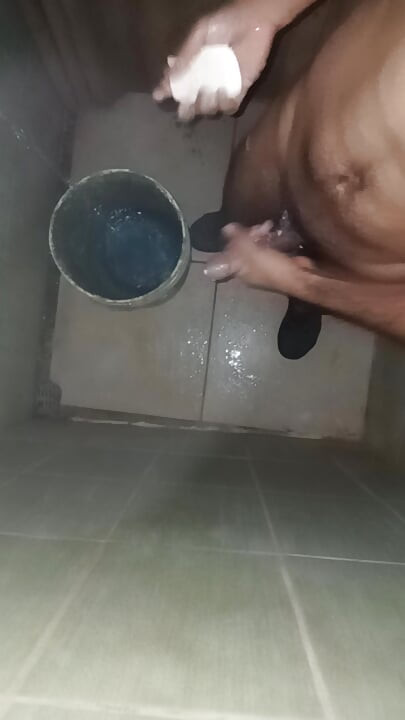 Slim guy takes his shower to masturbate