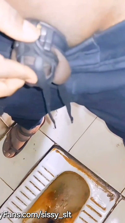 Ladyboy play with her limp little penis and piss | Clip 1