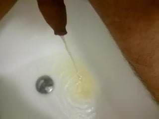 Me pissing in bathtub