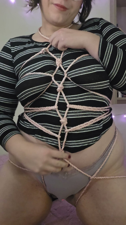 Brunette shows you her new rope harness