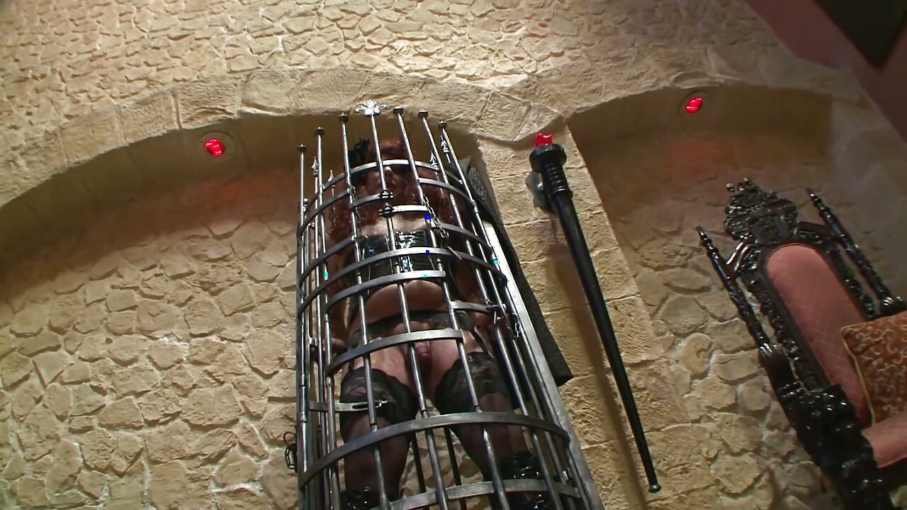 Mistress Dominates Masked Slaves in the Dungeon