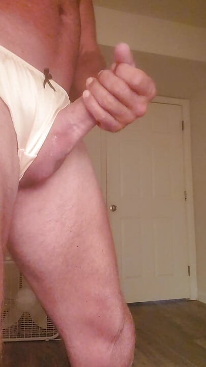 Playing in my satin thongs until I cum.