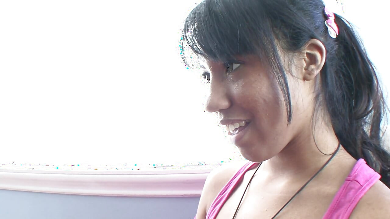 Lovely young babe in pink shirt deep throats