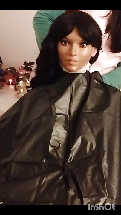 Ebony Sex doll Nikki shows off vinyl shampoo capes
