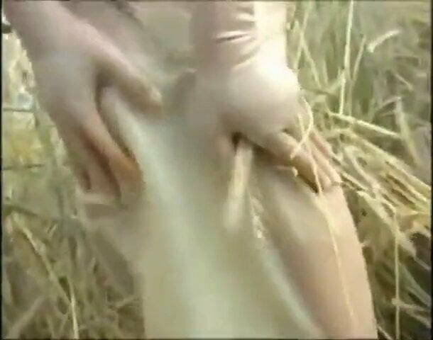 Fucking outdoors in a field