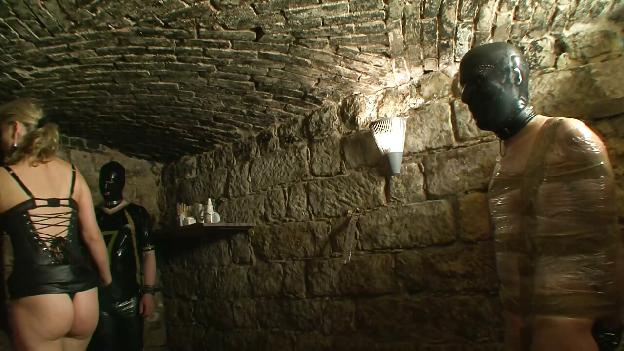 Merciless Mistress Breaks Her Masked Slaves in the Dungeon