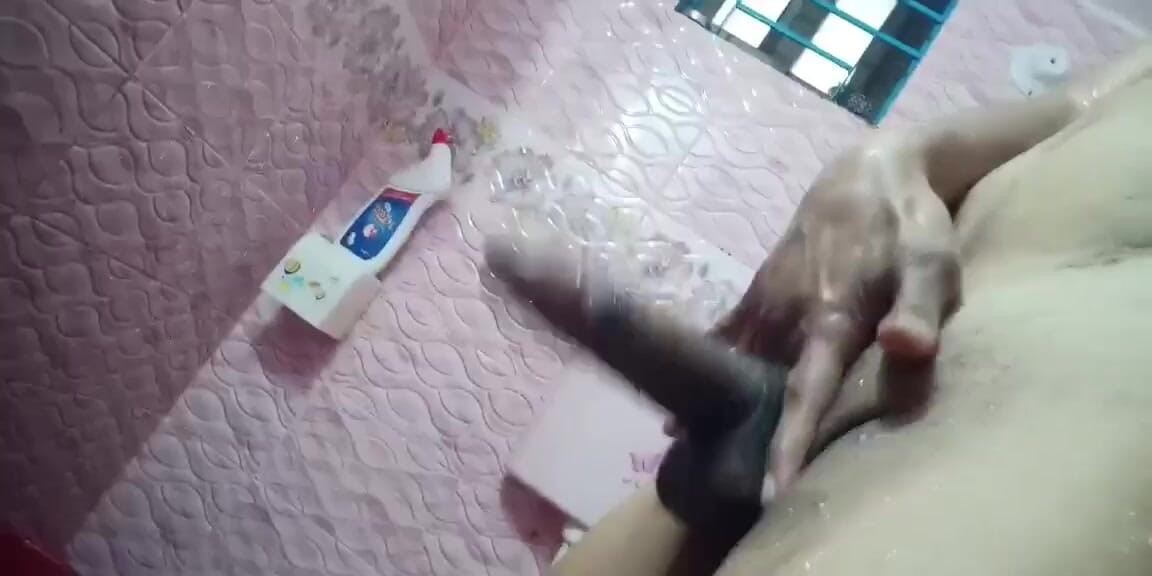 Masturbating