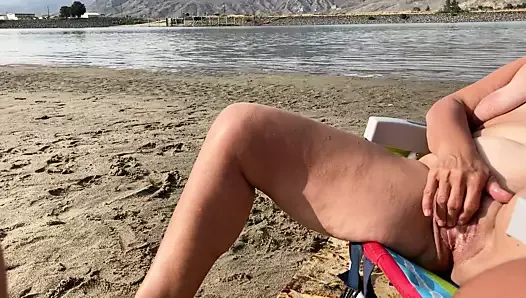 Masturbating on the beach