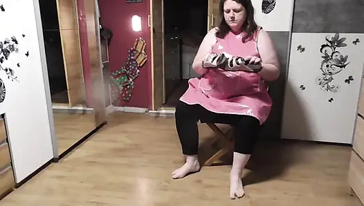 In the Rubber Apron I Flatten the Slippers