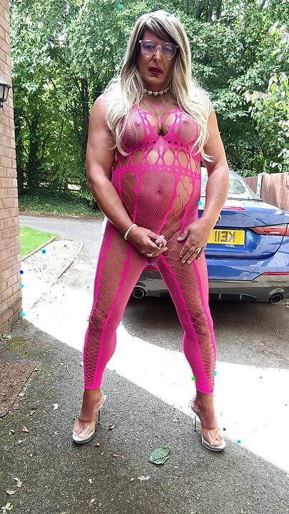 Sexy Crossdresser Kellycd2022's in pink fishnet catsuit and heels