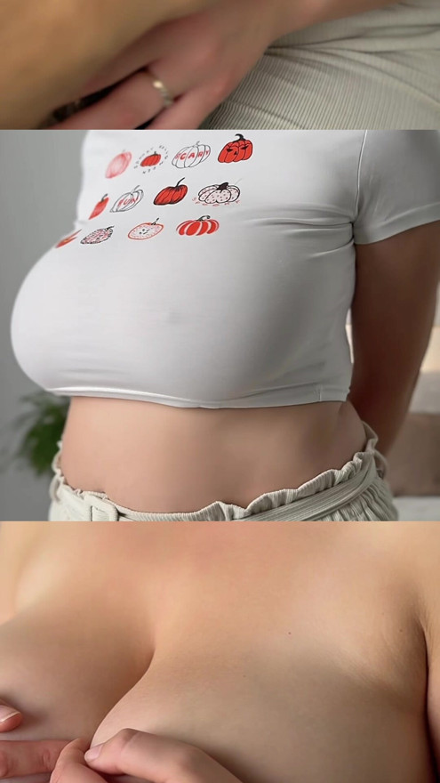 My wife's enormous breasts visible through her beautiful blouse