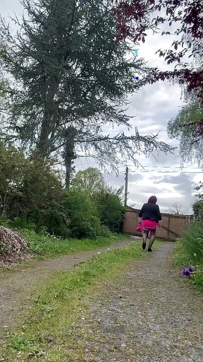 In an outfit with a short neon skirt for the evening