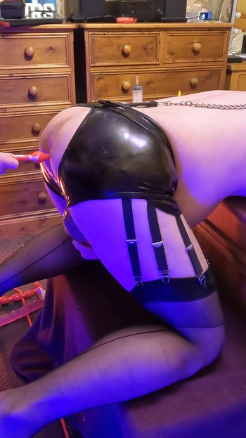 Key moment from "Maximum Anal Stuffing for my Sissy Boy! Deep Insertion and Pegging Reward!"