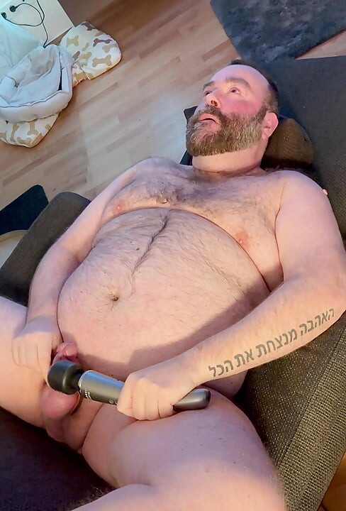Bear plays with his toy
