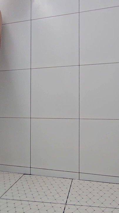 Sissy Kanisa Is Taking Shower in White Shower Room