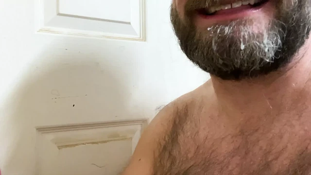 Hairy Step Dad sucks Ginger Meat through a Glory Hole