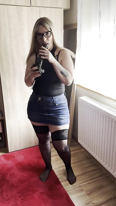 Masturbating with a Huge Black Cock in a Denim Miniskirt