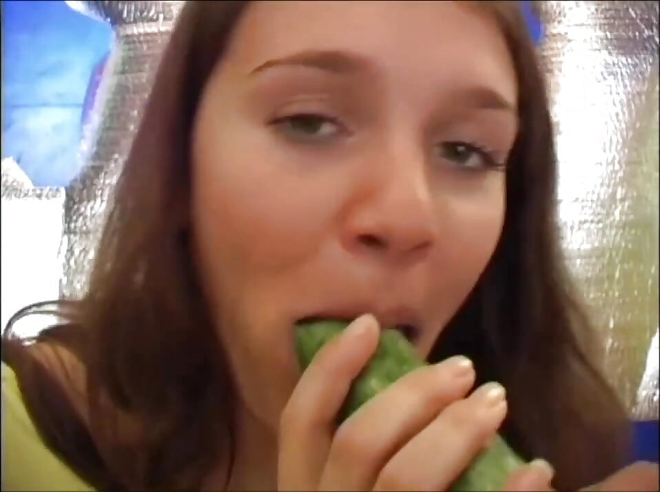 Lesbians Friends Play with a Cucumber