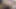 Güneşlenen bir sokakta kaslı, mavi saçlı, travesti femboy knelt, hizmete hazır. Bu femboy xxx porno