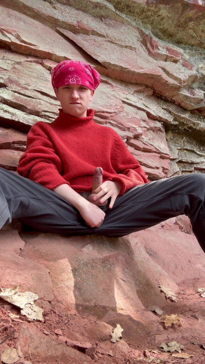 College boy plays with his hard cock on a hiking trail