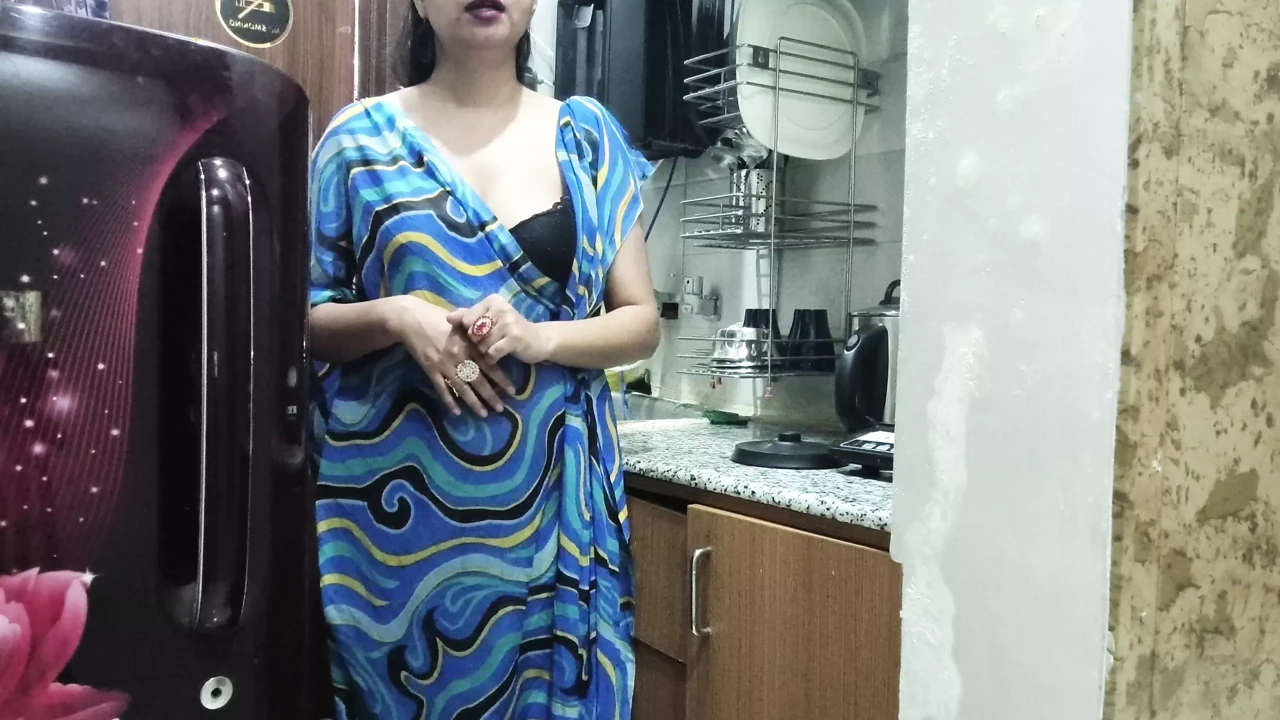 Indian stepmom watches and enters her stepson's Kitchen to fuck him.