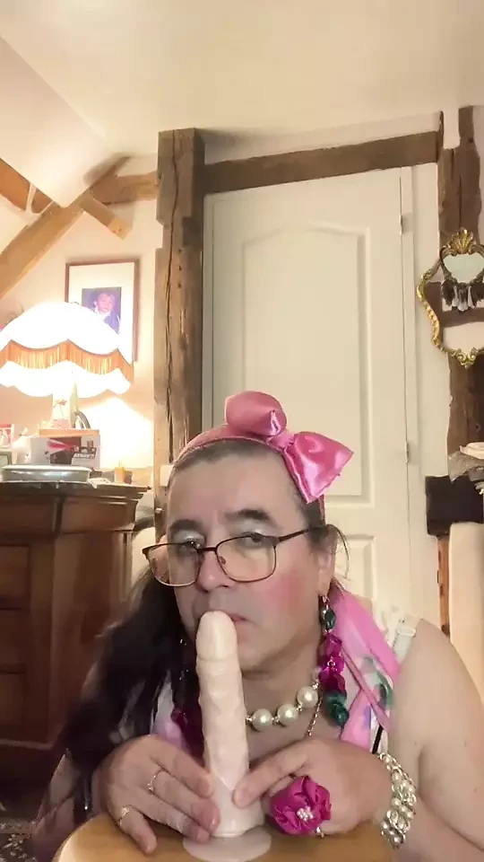 Outfit with a little floral dress to suck a dildo