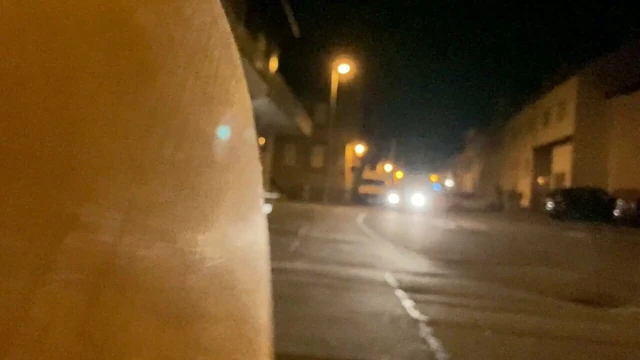 Crossdresser having fun outside in the dark