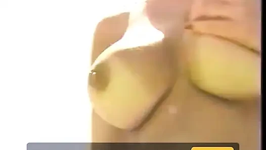 Sexy tanned blonde duo fuck on the beach with a strap on