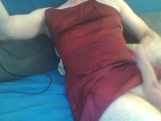 Red satin dress for a cute crossdresser pt.1