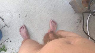 Pissing outdoors with cum still dripping