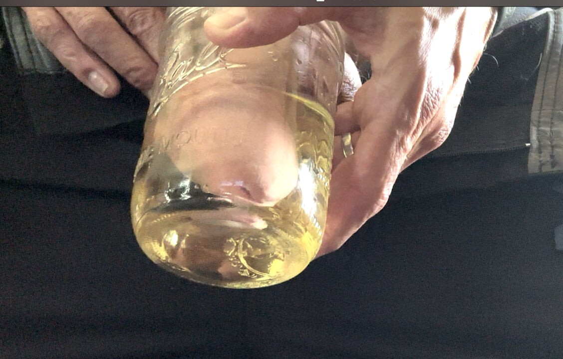 Erotic pissing in jar and masturbation