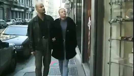 A Dirty Blonde Is Getting Fucked by Two Perverts in a Sex Shop