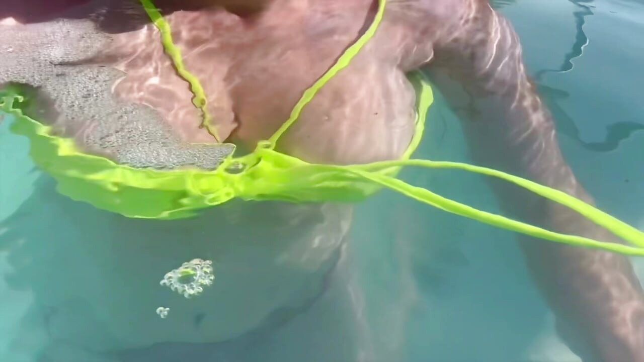 Artemisia Love flashing her juicy big tits underwater for you wearing a sexy bikini