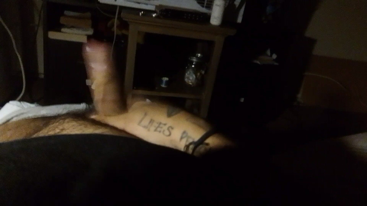 Masturbating