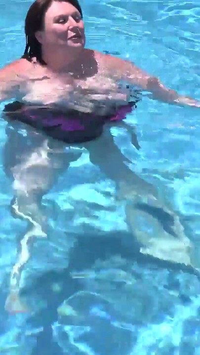 Busty Redhead MILF JoJo Robinson Goes Skinny Dipping in the Pool | Clip 1