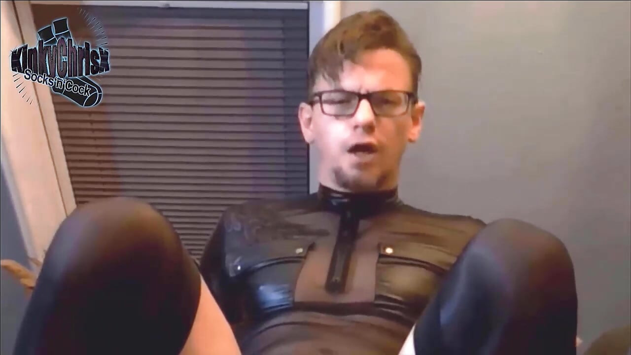 KinkyChrisX fucks his toy in black nylons and a garter belt.
