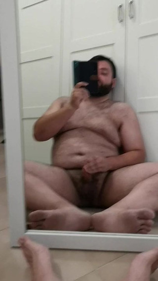 Cumming in front of mirror