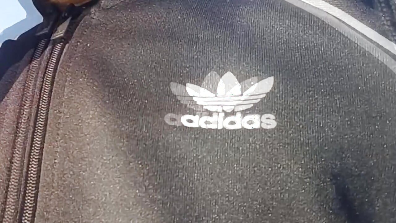 Who will spot this twink in a black and white adidas tracksuit, flashing his cock in public going commando freeballing, peeing i
