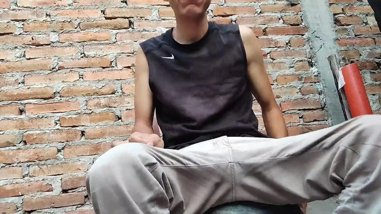 Guy masturbating with a condom and spilling his milk