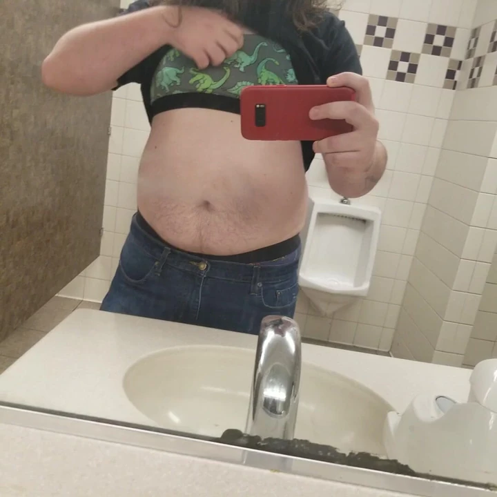 Showing off my bra and clamps in a public bathroom