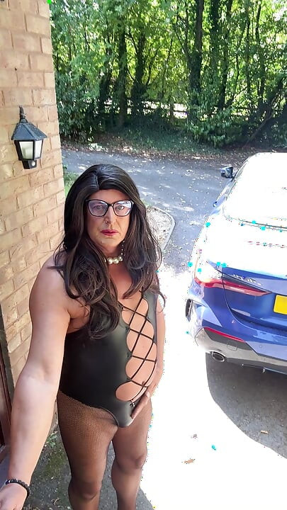Sexy Crossdresser Kellycd2022's in black pvc bodysuit and fishnet pantyhose