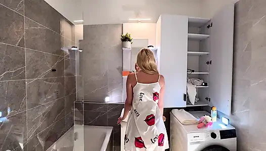 Super hot sexy blonde college girl in a satin nightie prepares for the night in the bathroom
