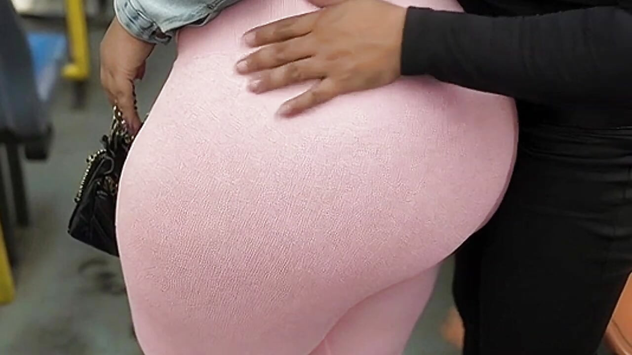 "Balaclava BBW Gets Ass  in Tight Shiny Pink Pants - Public Bus"