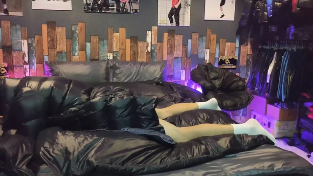 Cock Rubbing Down Jacket on Shiny Nylon Bed